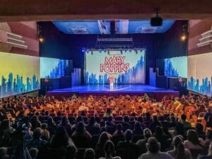 A picture of the main stage in Wichita Theatre in Wichita Falls Texas right before a performance of Mary Poppins the Musical begins